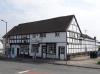 built in the 17th century with 19th and 20th century alterations; timber-frame and plaster