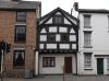 timber-frame and plaster house built in the 16th century or earlier; raised in the 17th or 18th century