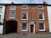 mid 18th century front to an earlier core
