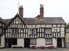 house, now cottages built in the 16th century and altered in the 18th century and later; timber-frame and plaster
