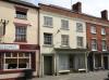built in the late 18th century with later alterations including a late 19th century shop front