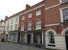 built in the late 18th century with later alterations including a late 19th century shop front