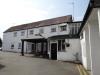 No.5: 18th century front to a 17th century core; No.7: built in the 19th century; No.9: built in the 17th century with 18th century alterations.