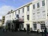 house at left is early/mid 18th century, facade probably 1820-40 with 17th century origins, later additions and alterations