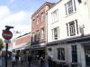 built circa 1770 possibly with earlier origins, with later additions and alterations including circa 1970s shop front