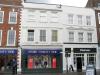 house and possibly shop, facade built circa 1820, probably with earlier origins and later additions and alterations
