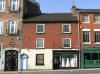 built in 1808-32 with later additions and alterations icluding late 19th century shop front.