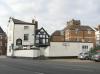 house built in the early-mid 18th century with later additions and alterations including 20th century attic dormers