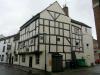 2 timber frame houses built in the 16th century, upper storey added circa 1666-78, refenestrated in 19th century, later additions and alterations