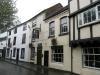 2 timber frame houses built in the 16th century, upper storey added circa 1666-78, refenestrated in 19th century, later additions and alterations