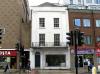 house probably built circa 1720, with refronting circa 1830 and later additions including 1970s shop front
