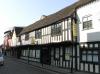 timber-framed house probably built circa1575-1625, Cross Keys Tavern from circa 1765, rear wings remodelled in brick in early-mid 18th century