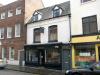 house built in the 17th century, front part rebuilt mid-late 18th century, shop front built circa 1880