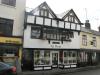 timber-framed house built for Richard Hodgkins, tallow chandler, dated 1642, stucco to front and re-reoofing in 1820-30