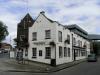 3 timber-framed houses probably built circa 1500-99, refronted circa 1800, with later additions and alterations