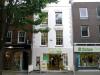 house built in the mid 18th century, possibly with earlier origins, stucco front probably early 19th century