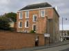 built circa 1700, with later alterations including stucco front probably in the early 19th century