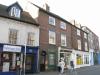 probably 2 houses buillt circa 1800, with later additions and alterations including shop fronts circa 1980-95