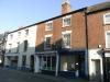 built in the early 19th century with later alterations including those to the ground floor circa 1880s