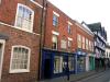 timber framed building probably built in the late 16th century with mid 19th century refronting and modern shop front