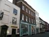 house built in the late 18th century probably with earlier origins and with later additions and alterations including 1980s shop front