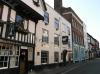 timber-framed house thought to date from circa 1550, early-mid 18th century facade with later additions and alterations