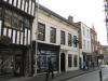 built in the mid 18th century with later alterations including shop fronts in the mid 19th century