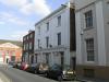 house probably built in the late 18th century with mid 19th century refronting and later additions and alterations