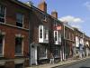 pair of houses built circa 1830 with later additions and alterations