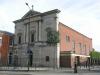 built in 1820 with later alterations to chancel in 1880 and west facade in 1887, designed by Henry Rowe with alterations probably by S J Nicholl