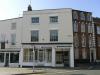 built in the late 18th century with later additions and alterations including late 19th century shop front