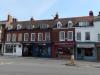 terrace of 5 houses built in the early 18th century with later additions and alterations