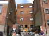 warehouse built circa 1840 and late 18th century house at rear of warehouse