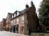 end terrace house built in the late 18th century, with later additions and alterations and major repairs circa 1989