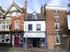 probably built in the 17th century incorporating part of the medieval city walls to the cellar, with later additions and alterations including circ a1900 shop front