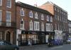 built in the late 18th century with later additions and alterations including the single window range on the far left