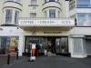 upper floors retain early 19th century features, ground floor retains some Art Deco features